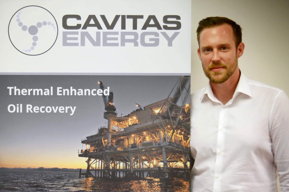 image of a Cavitas Energy Oil Recovery slogan with a white suited man beside it