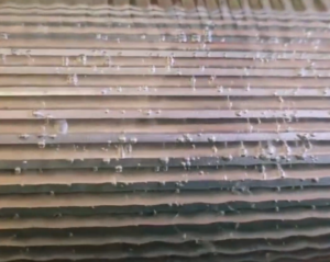 metal rods inside a hard plastic wrap filled with bubbles